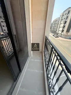For annual rent in Ajman, Al Jurf 3, on Mohammed Bin Zayed Road: two bedrooms and a living room