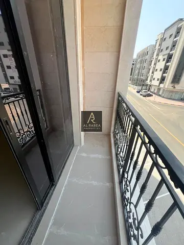For annual rent in Ajman, Al Jurf 3, on Mohammed Bin Zayed Road: two bedrooms and a living room