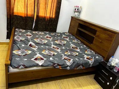 Single wooden bed frame with mattress and headboard - good condition