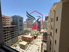 Luxury 1BR apartment for annual rent in Al Qasimia Al Mahatta, free AC, open view.