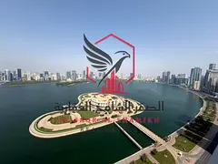 Full sea view overlooking Al Majaz Amphitheatre – a spacious three-bedroom apartment with a living