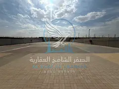 A compound in Al Sajaa, Sharjah, strategically located on a main road in the heart of the automotive