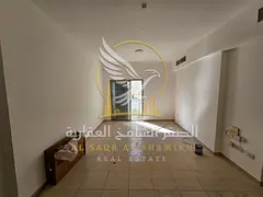 2BR apartment for annual rent with balcony open view spacious layout free gym and pool central AC mo