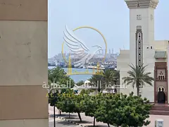 Two bedroom apartment with a living room in Al Majaz for annual rent Central air conditioning spacio