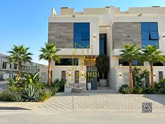 Own your dream villa Modern design with a roof , registration fees included . Close to the mosque an