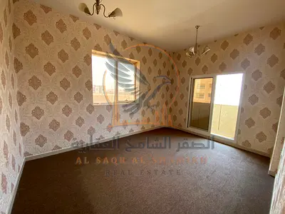 Two-bedroom apartment with a living room, two bathrooms and a balcony featuring excellent space and high-end finishes in a prime location on Sheikh Am