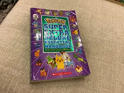 Pokémon Super Extra Deluxe Essential Handbook (Scholastic)