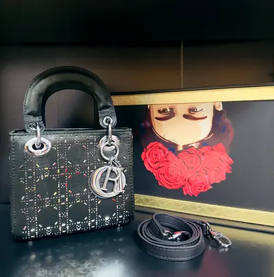 Preloved Mini lady Dior bag in embellished satin material