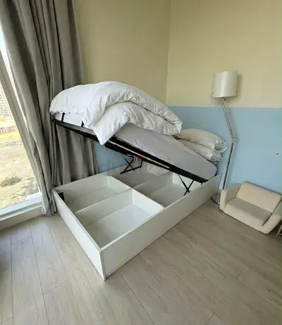 home center double bed with Hydraulic Loft storage, in perfect condition with a expensive mattress