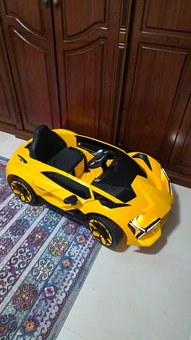 Yellow electric ride-on car for kids — excellent condition.  Received as a gift . No space.  Remote