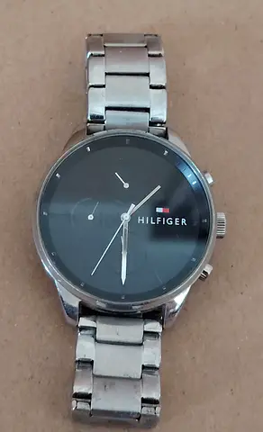 Tommy Hilfiger men's stainless steel wristwatch - needs minor servicing