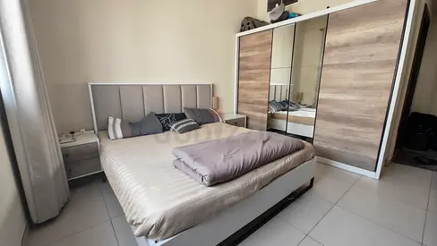 Queen bed with mattress, bedside tables and large mirrored wardrobe - set