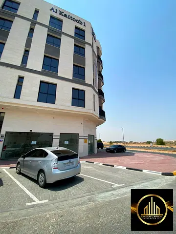 Corner residential/commercial building on the main street for sale in Al-Alia, Ajman. Fully rented.