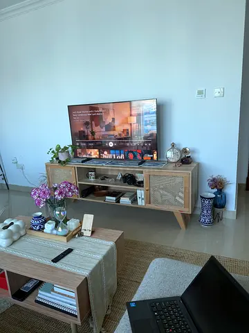 Light wood TV console / entertainment unit with rattan doors - good as new