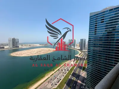 **Asas Tower | 2BR + Maid’s Room | Free A/C | Free Parking | Free Gym & Pool | Spacious | Sea View Balcony | Near Dubai**