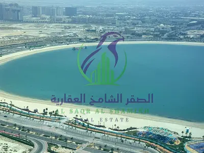 Two bedroom apartment for annual rent in Al Mamzar Sharjah sea view overlooking Al Mamzar Dubai free gym swimming pool and parking spacious area super