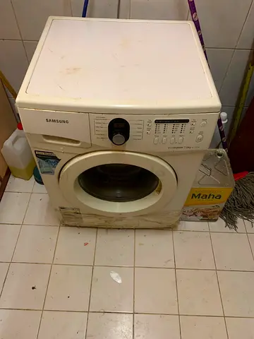 Used Samsung Front Load Washing Machine - Needs Cleaning/Repair