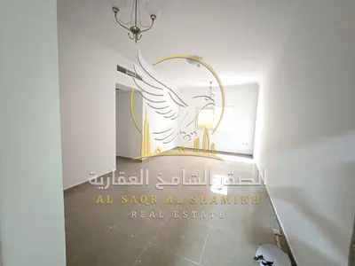Two bedroom apartment with a living room in Al Qulaya featuring a spacious layout modern finishing built in wardrobes a prime location