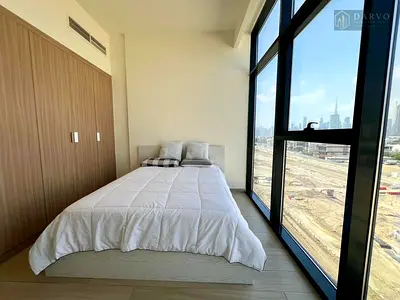 Stunning Lagoon & Burj Views: Fully Furnished 1BR in Azizi Riviera | Prime Meydan Location