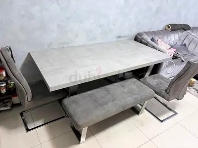 Modern grey dining table set with bench and chairs