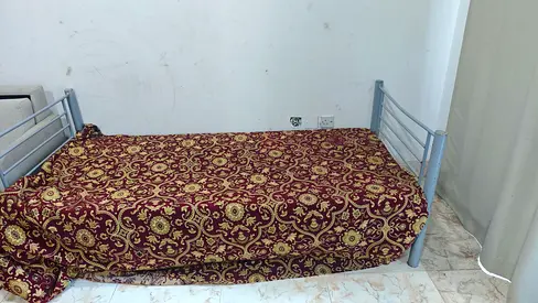 Single metal bed frame with mattress