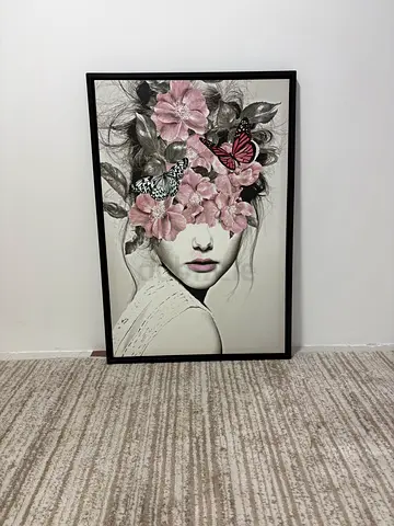 Framed portrait art print of woman with floral and butterfly overlay