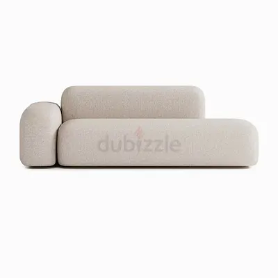 Modern cream two-seater sofa with rounded cushions