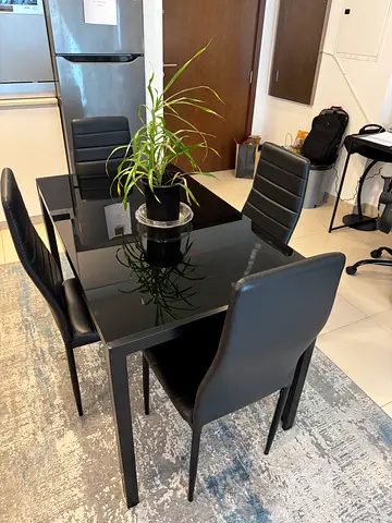 Black Glass Dining Table with 4 Faux Leather Chairs - Good Condition