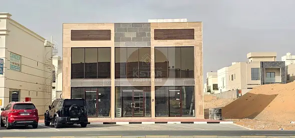 PLOT SIZE 3200 SQ FT BRAND NEW COMMERCIAL PROPERTY WITH 2 SHOPS 400 SQ FT EACH AND 1 SHOWROOM 3500 SQ FT ON MAIN COMMERCIAL MARKET IN AL ZAHYA AJMAN