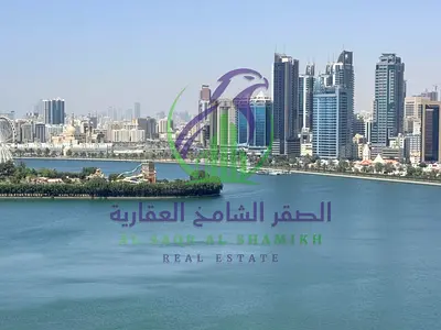 Luxury two Bedroom Apartment with Direct Sea View Free AC Gym Pool and Parking on Al Majaz three Corniche