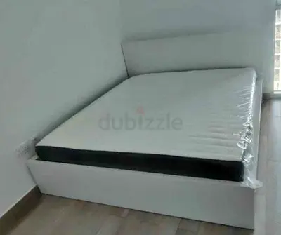IKEA malam queen‑size bed (160 × 200 cm) with 2 storage drawers and an IKEA mattress