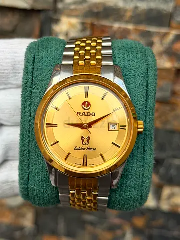 Rado Golden Horse Automatic watch features a distinctive two-tone gold and steel bracelet.
