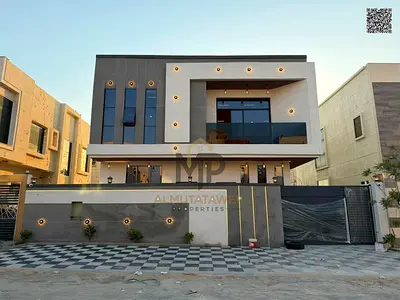 Modern villa for sale with luxurious finishes and high-end modern specifications, including registration fees, in a prime strategic location close to