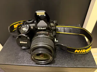Nikon camera D3100 like brand new with all accessories only 1000aed