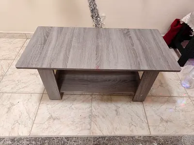 Simple grey wooden coffee table with lower shelf - good condition