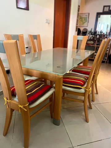 Wood dining table with 6 chairs and glass top - great condition