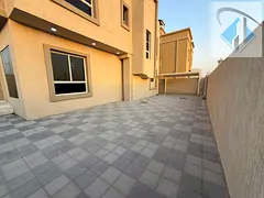 For annual rent: 5-bedroom villa with a large yard and a shaded area.