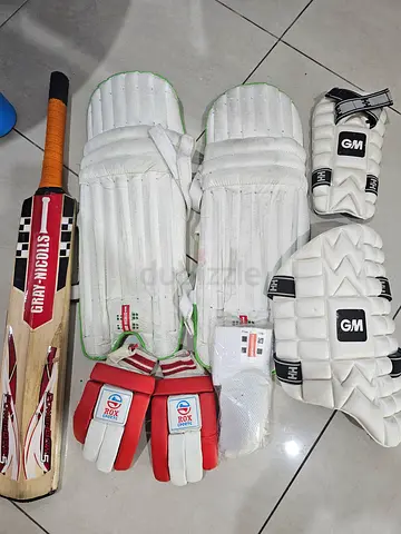 Cricket kit: Bat, pads, gloves and wicket-keeping gloves - used