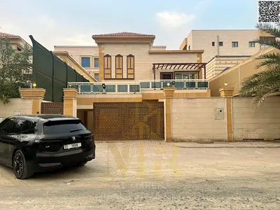 Villa for sale at an attractive price, suitable for residential or investment purposes, in Al Muwaihat 3 area. Two floors plus a roof terrace. 6 maste
