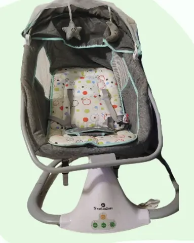 Electric baby swing/rocker with canopy and mobile - good condition