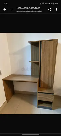 Compact wooden study desk with shelving and drawers