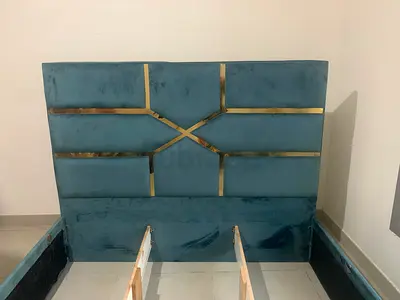 King-size velvet bed frame with decorative brass inlay headboard