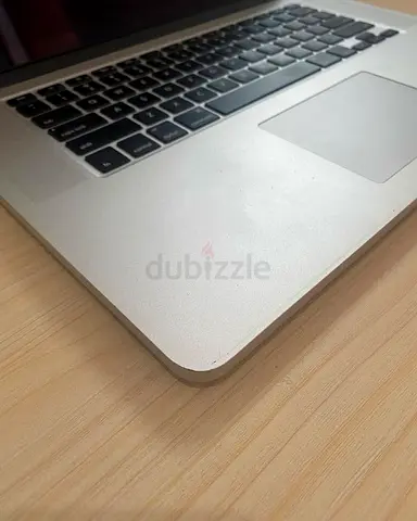 Used Silver Laptop (MacBook-style) - Good Working Condition