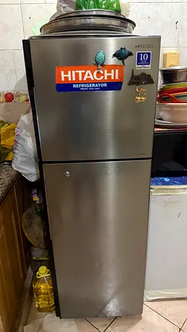 Hitachi double-door refrigerator in working condition, stainless steel finish