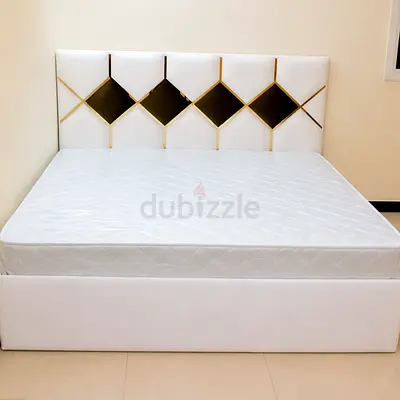 New Queen bed frame with upholstered storage base and decorative headboard