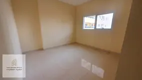Premium Al Qasba Apartment with Open View – 2BR + Hall, 2 Bathrooms, Free Parking & 1 Month Free 