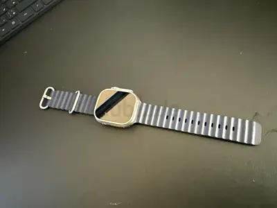 Used Apple Watch Series (silver case) with grey silicone strap - good condition