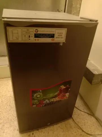 Compact single-door mini fridge — good working condition