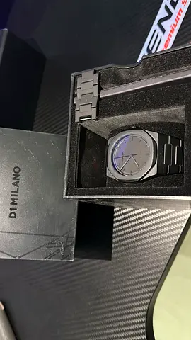 D1 Milano black stainless steel men's watch with extra links, used