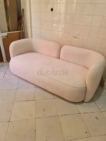 Cream boucle 3-seater curved sofa in good condition